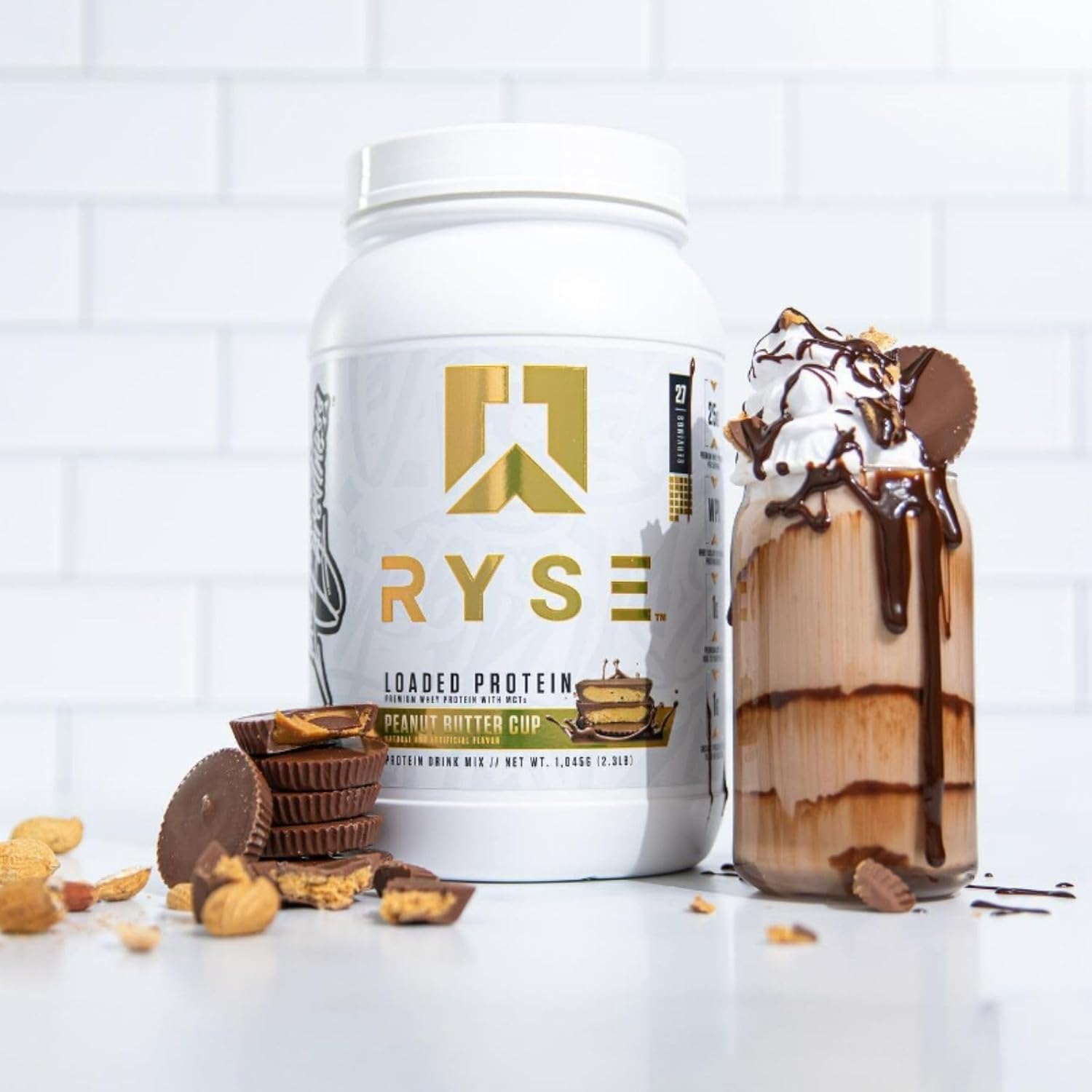 پودر پروتئین وی ایزوله رایز ساپلیمنتس مدل Loaded Whey، ۲۵ گرم پروتئین، ۵۴ سروینگ و طعم شکلات و کره بادام‌زمینی