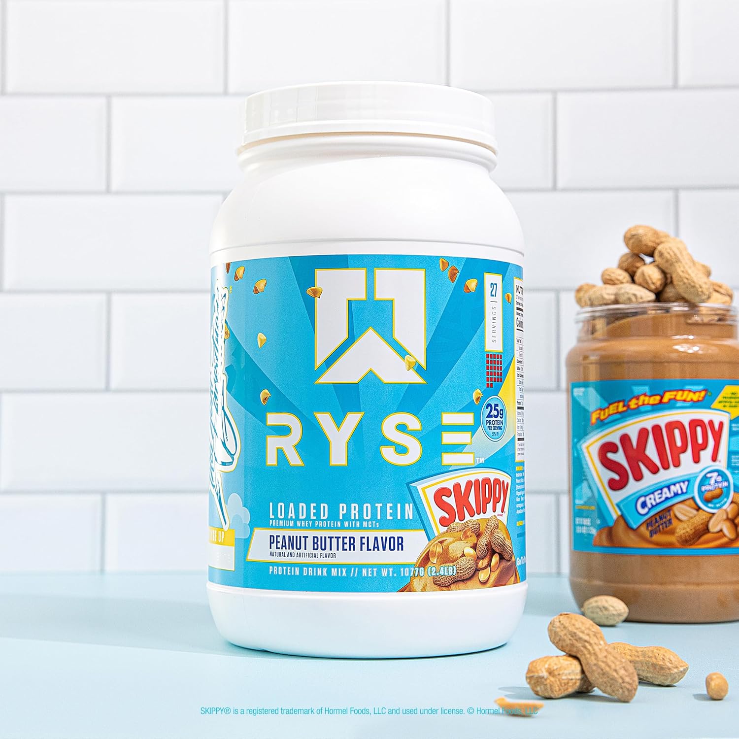 پودر پروتئین وی ایزوله رایز ساپلیمنتس مدل Loaded Whey، ۲۵ گرم پروتئین، ۲۷ سروینگ و طعم کره بادام‌زمینی اسکیپی
